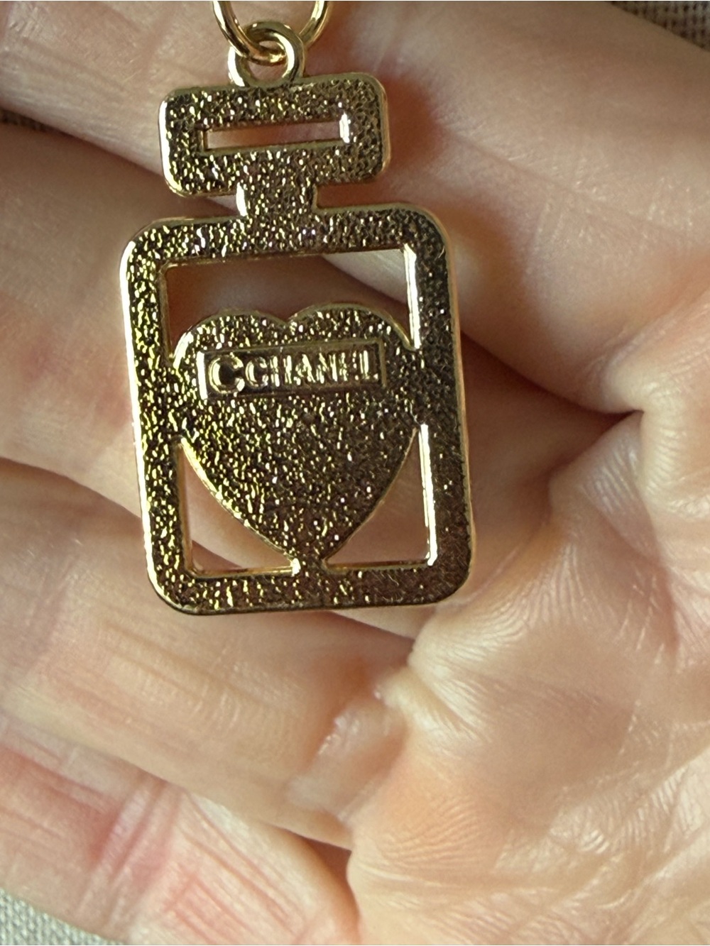 ChaneI Gold Tone Perfume Bottle Pendant Necklace with Pearl on Black Heart - Picture 3 of 6